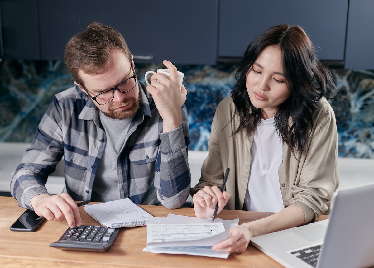 Couple reviewing household bills